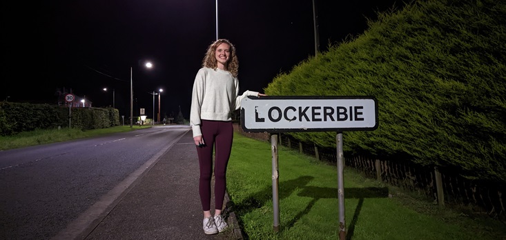 Emma near a sign in Lockerbie
